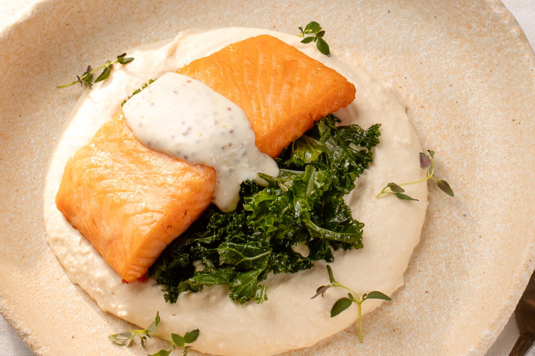 Roast Scottish Salmon Fillet with White Bean Purée, Sautéed Kale, and Creamy Wholegrain Mustard Sauce